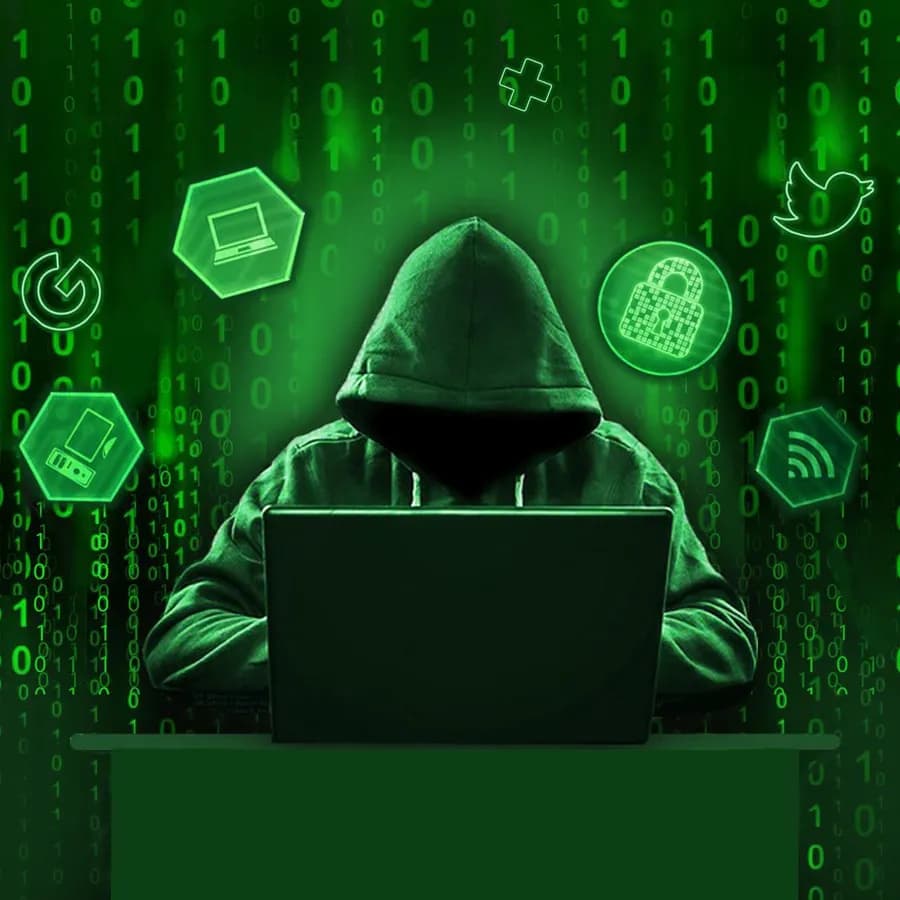 Green hacker on a laptop wallpaper used as a cybersecurity learning visual